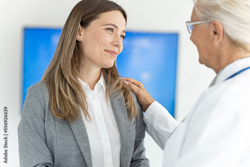 Senior doctor talking with woman patient
They are smiling and looking each other Senior doctor talking with woman patient
They are smiling and looking each other