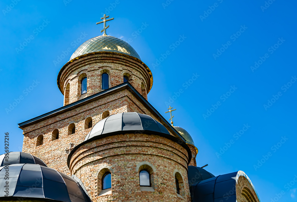 Fototapeta premium Christian church cross in high steeple tower for prayer