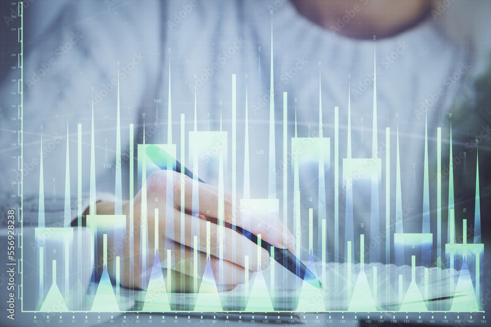 Forex chart displayed on woman's hand taking notes background. Concept of research. Multi exposure Forex chart displayed on woman's hand taking notes background. Concept of research. Multi exposure