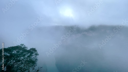 shot of the sumidero canyon with clouds covering the reflection of the sun photo