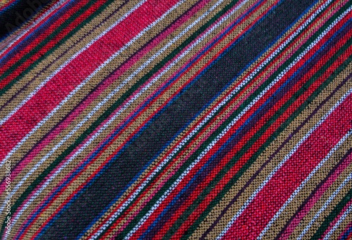 Crochet texture of colored striped knitted fabric