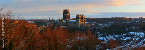 Panoramic view of Durham City bathed in warm evening light on a Winter evening. County Durham, England, UK.