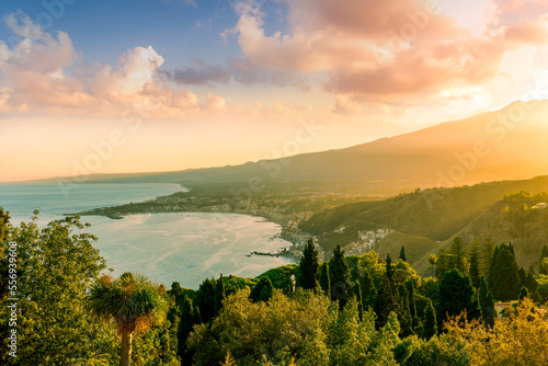 highland mediterranean travel landscape scenic picture from green garden to a beautiful mountain town in sunrise or sunset