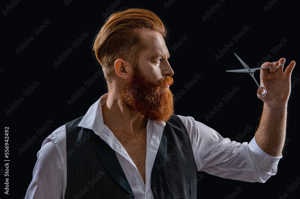 photo of caucasian hairdresser man on background. hairdresser man isolated in black. photo of caucasian hairdresser man on background. hairdresser man isolated in black.