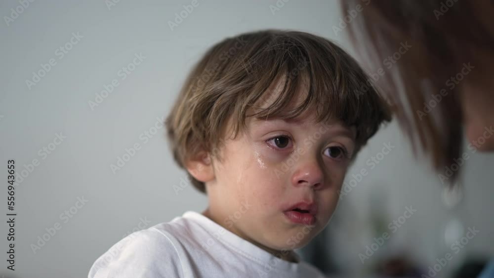 Portrait of a tearful child crying. Closeup face of a sad little boy. Authentic real life kid cries. Lifestyle sobbing moment Portrait of a tearful child crying. Closeup face of a sad little boy. Authentic real life kid cries. Lifestyle sobbing moment