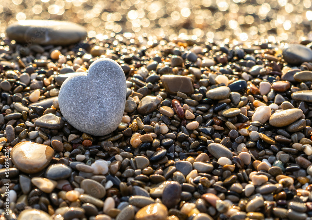 Stone Heart on Pebble Beach, Shining Ocean Water, Rocky Shore Love Symbole, Summer Pebble Heart Stone Heart on Pebble Beach, Shining Ocean Water, Rocky Shore Love Symbole, Summer Pebble Heart