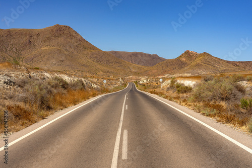 Road in the desert zone in the Gata Cape Natural Park coast. Almería, Andalucía, Spain..