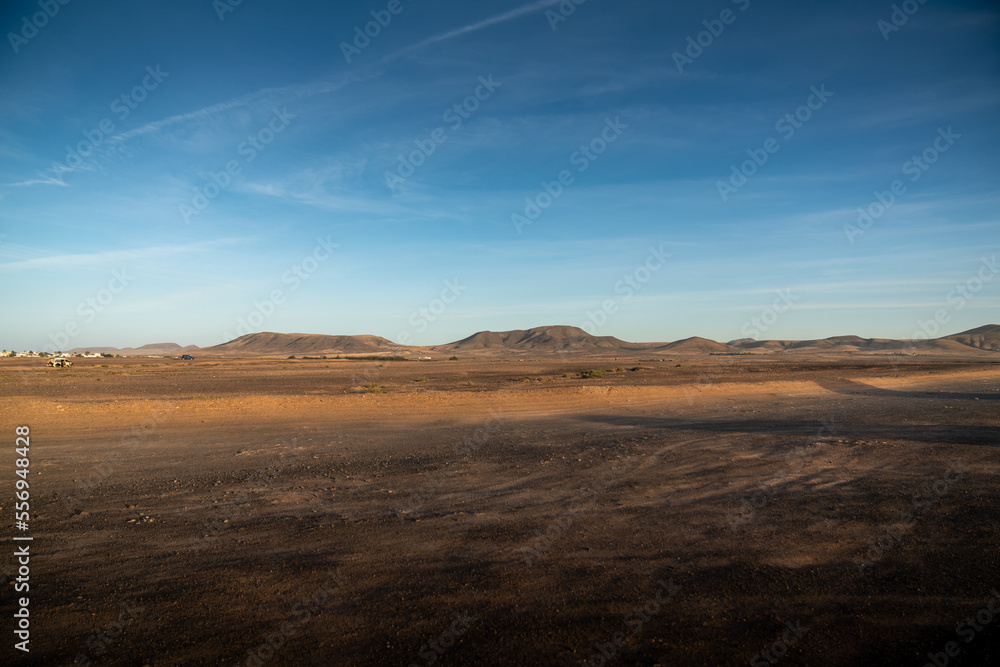 sunset in the desert of islas canarias - fuerteventura sunset in the desert of islas canarias - fuerteventura