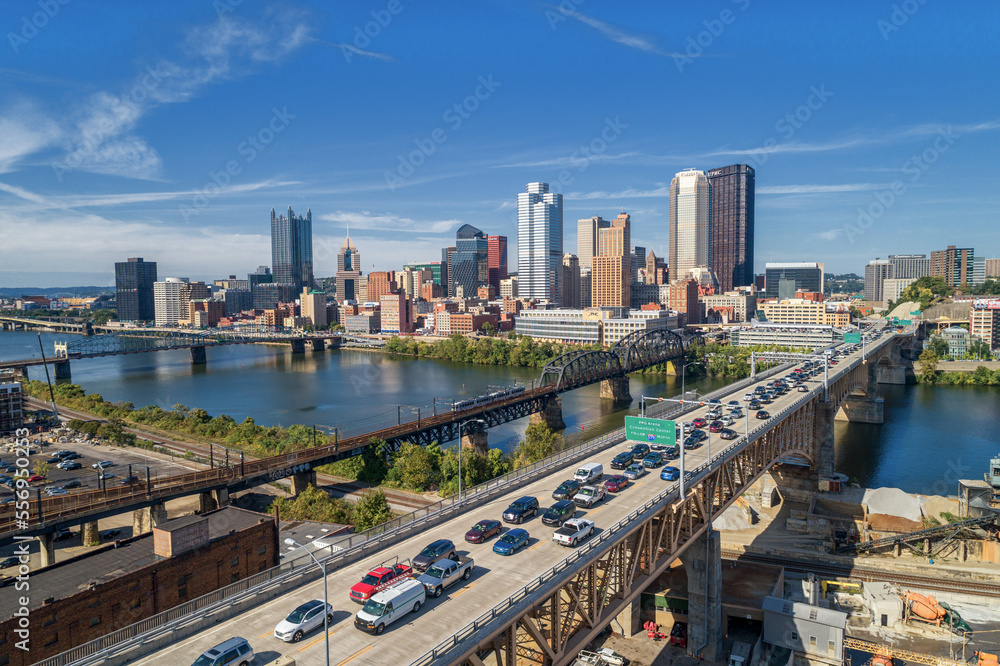 Pittsburgh Skyline with Downtown and Business District. Train Bridge and Liberty Bridge.