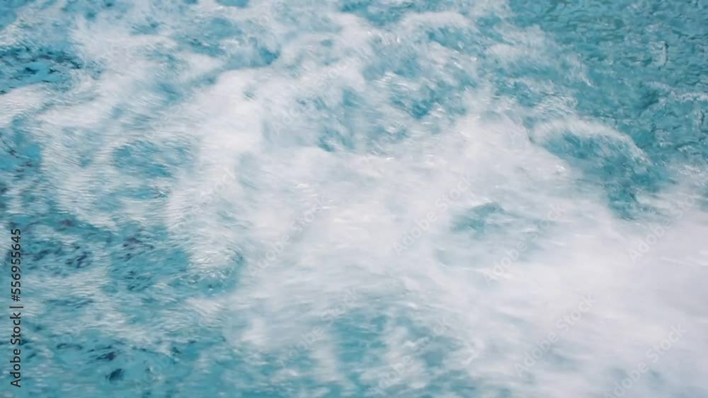 flowing water on abstract blue water surface background flowing water on abstract blue water surface background