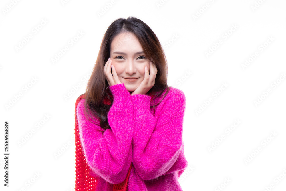 Fall and winter fashion concept. Charming beautiful young woman happy smiling brunette, woman wearing knitted pink sweater and red scarf isolated on white background. Fall and winter fashion concept. Charming beautiful young woman happy smiling brunette, woman wearing knitted pink sweater and red scarf isolated on white background.