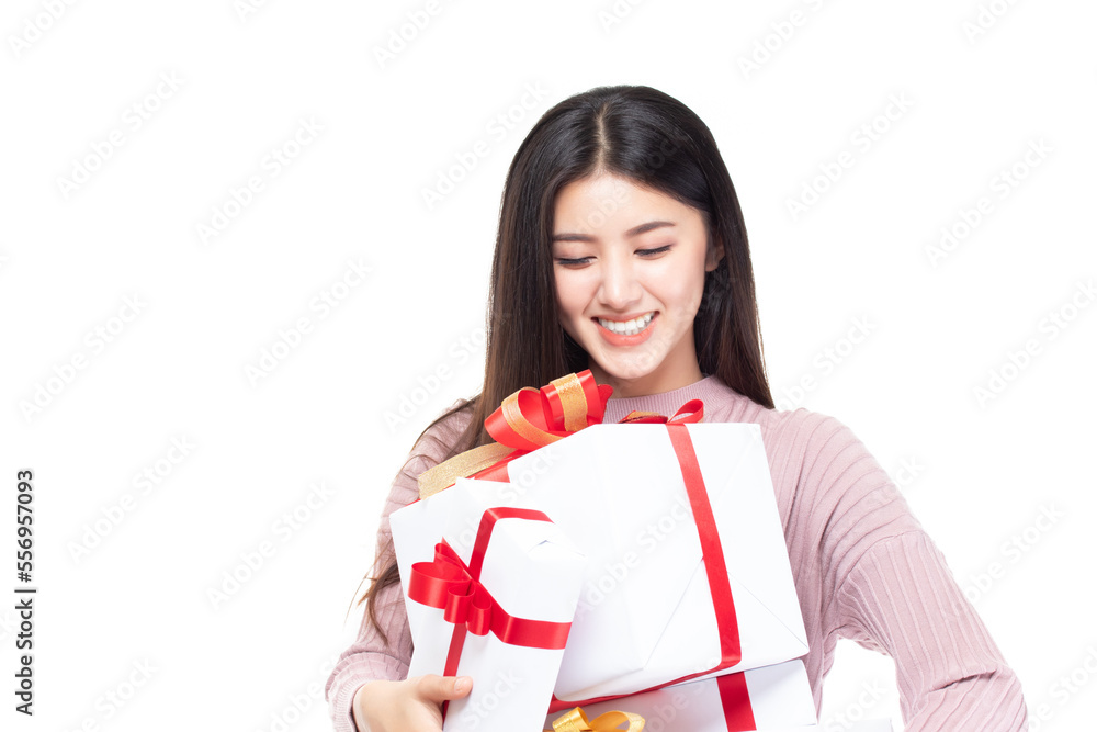 Attractive asian woman holding gift box in christmas, new year, valentine day, birthday celebration concept. Portrait of smiling happy pretty girl hold gift box isolated on white with copy space. Attractive asian woman holding gift box in christmas, new year, valentine day, birthday celebration concept. Portrait of smiling happy pretty girl hold gift box isolated on white with copy space.