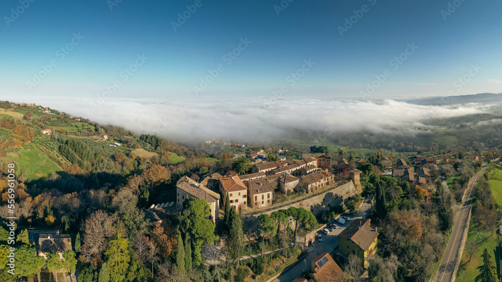 Italy, December 2022: aerial view of the beautiful medieval village of Montegridolfo in the province of Rimini in the Emilia Romagna region bordering the Marche region