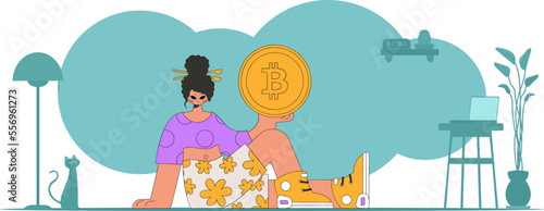 The girl is holding a bitcoin. Cryptocurrency and fiat exchange concept.
