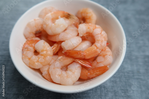 cooked shrimps in a bowl on table 