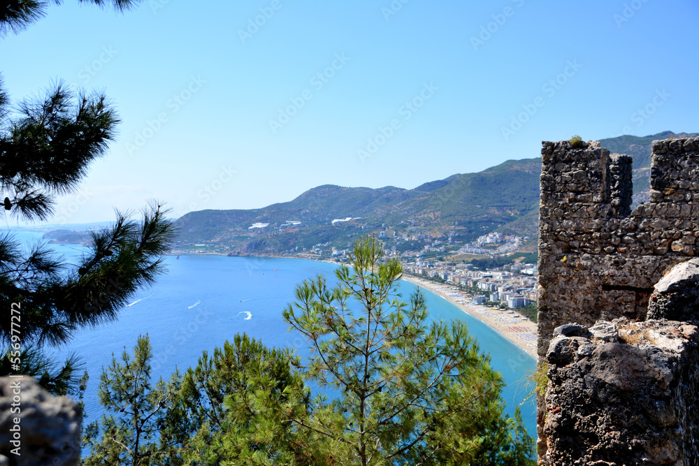 Alanya town with mediterranean coast and hills, view from top