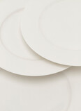 large white plates close-up 