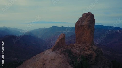 Roque Nublo mountain in Gran Canaria, Canary Islands on a blue day. Cinematic camera movement. High quality FullHD footage