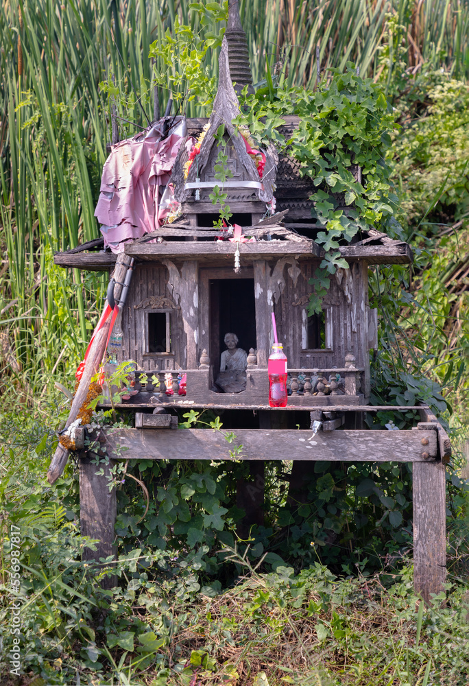 A old wooden spirit house or Joss house built for guardian spirit to ... - Spirit Shared Wooden Structure