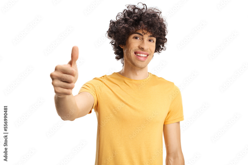 Guy with curly hair showing a thumb up sign Guy with curly hair showing a thumb up sign