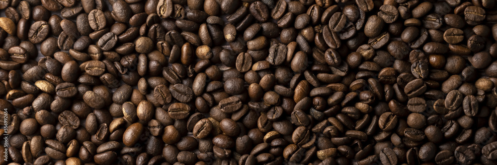 Roasted coffee beans background. Healthy beverage ingredients Roasted coffee beans background. Healthy beverage ingredients