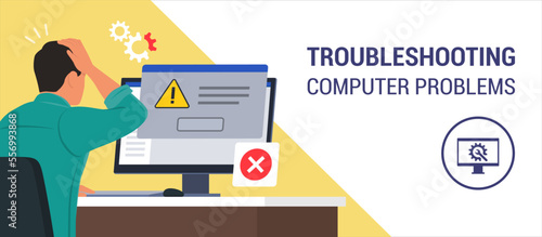 Man reading an error message notification on the computer screen