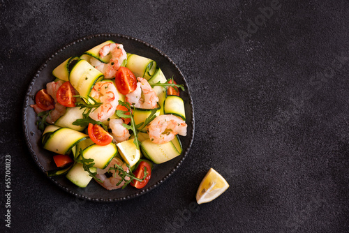 Delisicous fresh seafood salad with shrimps and zucchini
