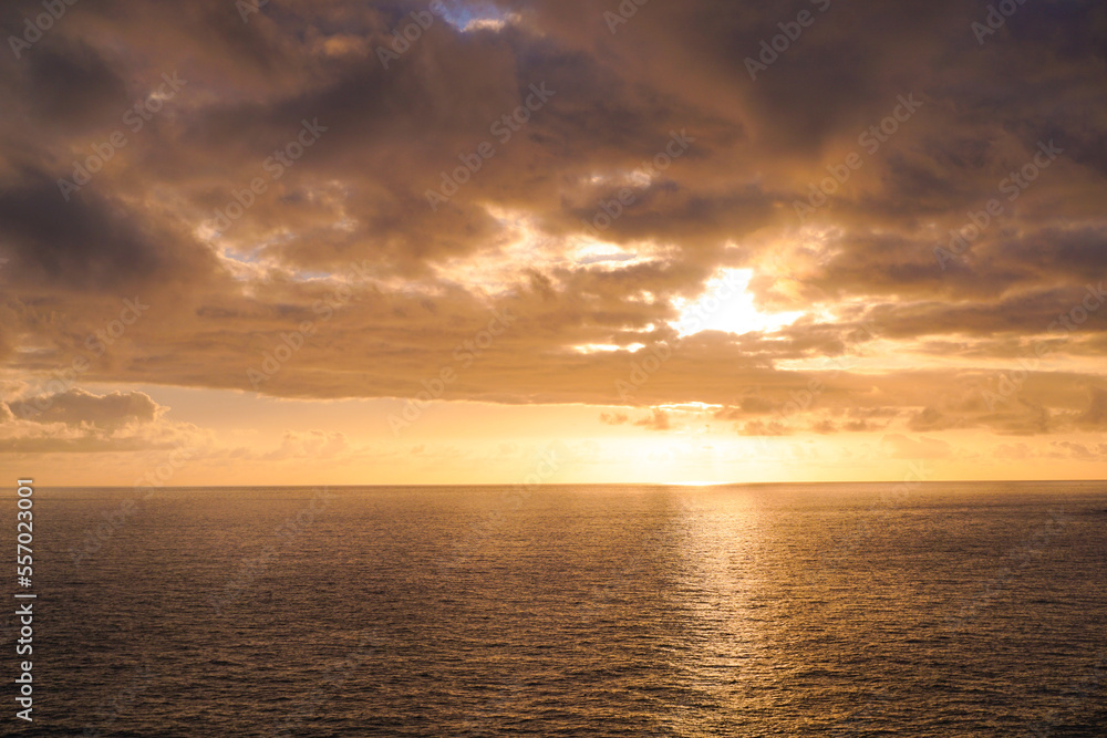 Sunset over the ocean at Madeira island in Portugal