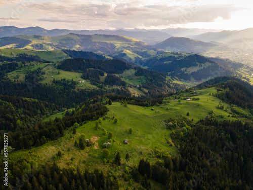 Carpathian mountains summer landscape, seasonal natural background with green hills, blue sky and white clouds. Panoramic view © dvv1989