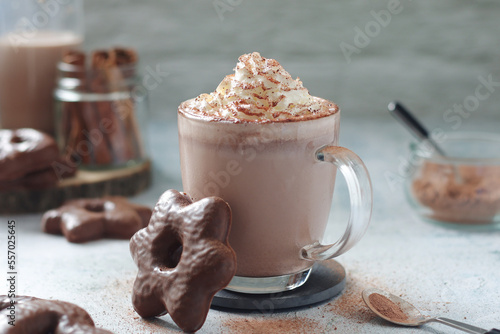 A glass mug with hot chocolate