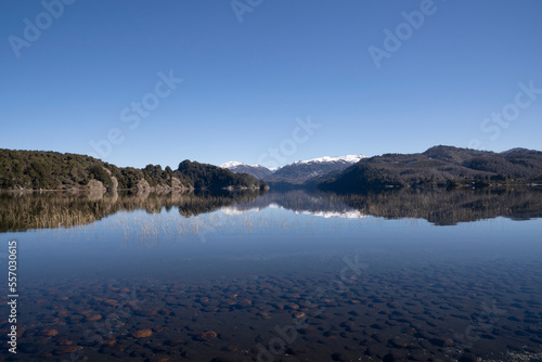 View of volcano Bate Mahuida and Alumine lake in a sunny day.