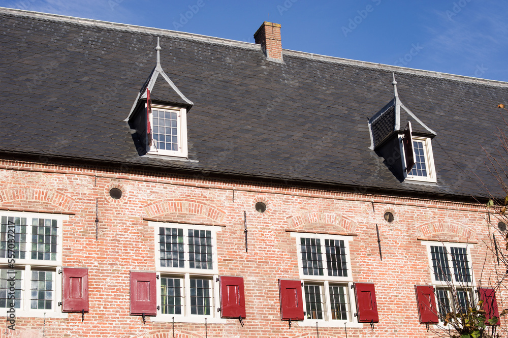 Roof with black roof tiles of medieval house in the center of Amersfoort in the Netherlands
