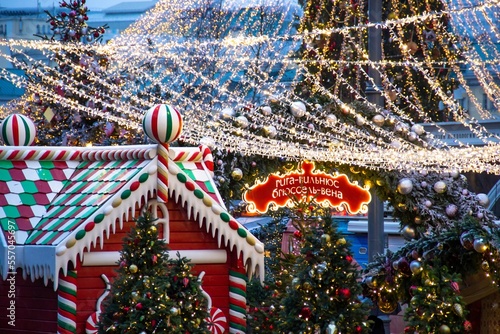 Photography Christmas tree and big giant gingerbread house stall.