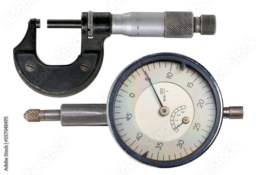 A micrometer for making precision measurements and a dial gauge for shaft runout measurements on an isolated background. photo