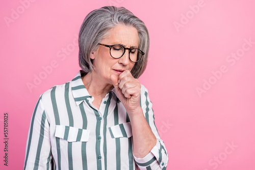 Photo of upset depressed lady wear smart casual clothes coughing empty space isolated pink color background