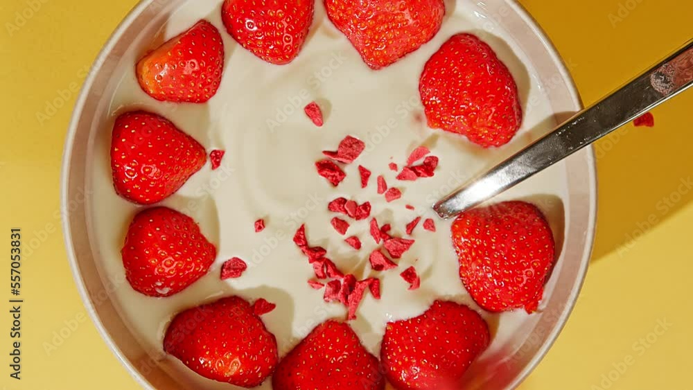 Yogurt with raspberry and strawberry in a bowl Yogurt with raspberry and strawberry in a bowl