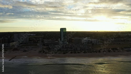 Tall building in Port Elizabeth aerial shot over the ocean  