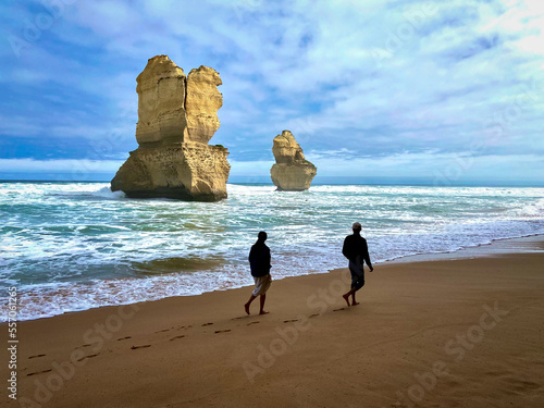 people walking on the beach