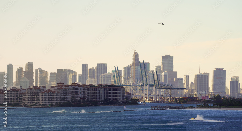 Naklejka premium Beautiful aerial panoramic view of the city of Miami, its buildings, marina, yachts and luxurious suburbs houses