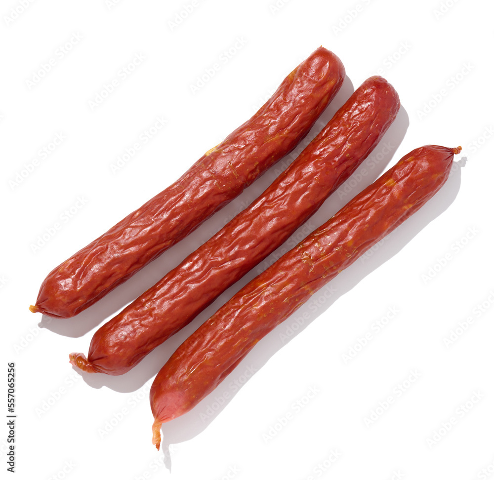 Small smoked sausages on a white isolated background, top view Small smoked sausages on a white isolated background, top view