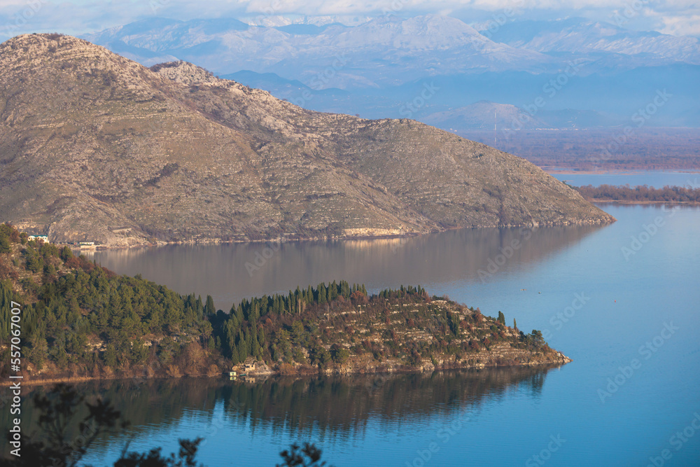 Obraz premium Aerial view of Skadar Lake National park panoramic landscape, Montenegro, Skadarsko jezero, also called Shkodra or Scutari, with mountains in a sunny day