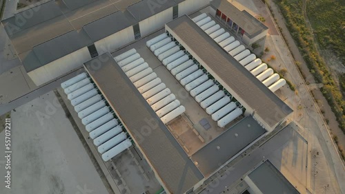 Desalination plant. Desalination water tanks. Industrial equipment for water purification. Drinking water factory or plant production. Large metal tanks for filtering. Drone Aerial video.
