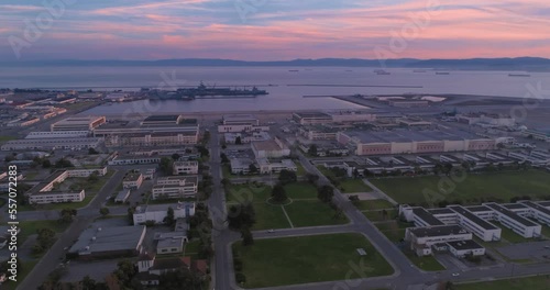 Aerial: Flying over decommissioned Alameda naval base, San Francisco, California, USA photo