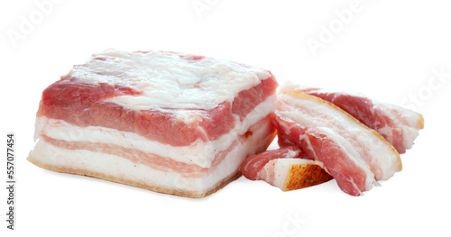 Pieces of tasty pork fatback on white background
