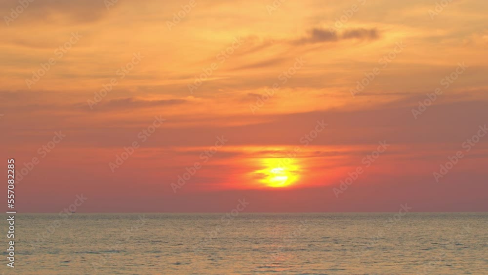 stunning yellow sun in red sky above the island in sunrise..Scene of Colorful romantic sky sunrise.Gradient color..nature cloudscape sky and Clouds moving away rolling. stunning yellow sun in red sky above the island in sunrise..Scene of Colorful romantic sky sunrise.Gradient color..nature cloudscape sky and Clouds moving away rolling.
