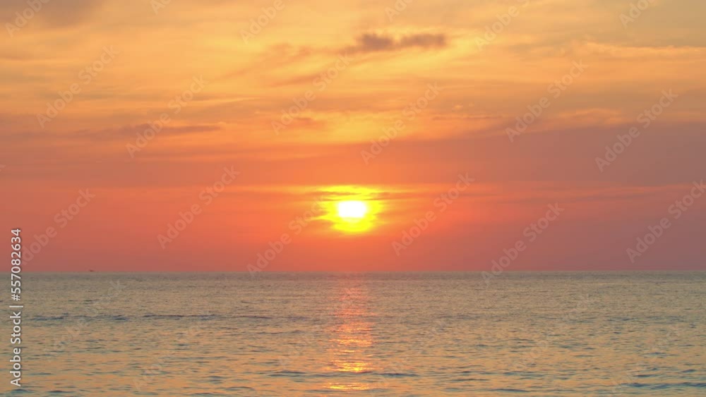 stunning yellow sun in red sky above the island in sunrise..Scene of Colorful romantic sky sunrise.Gradient color..nature cloudscape sky and Clouds moving away rolling. stunning yellow sun in red sky above the island in sunrise..Scene of Colorful romantic sky sunrise.Gradient color..nature cloudscape sky and Clouds moving away rolling.