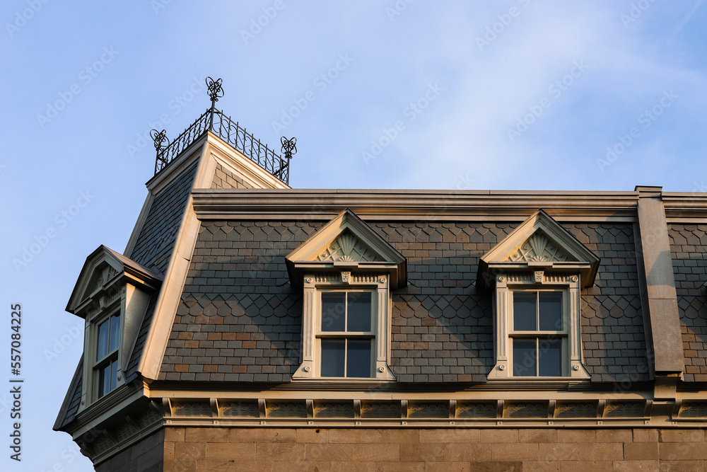 Ancient architecture of the old town. details of houses - roofs, walls, stucco decoration, beautiful windows Ancient architecture of the old town. details of houses - roofs, walls, stucco decoration, beautiful windows