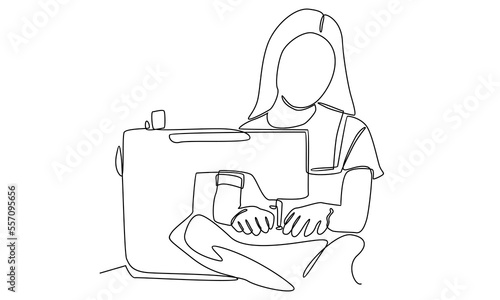 continuous line of woman using sewing machine
