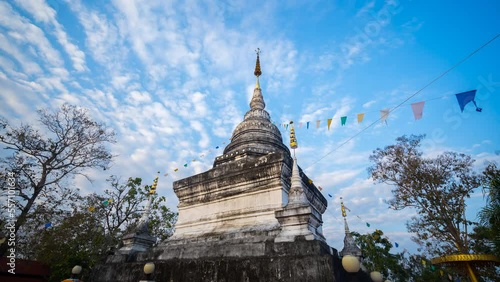 Time-lapse of flying cloud above Old Pagoda of Thai Temple view from Wat Phrathat Khao Noi of Nan province, Thailand.