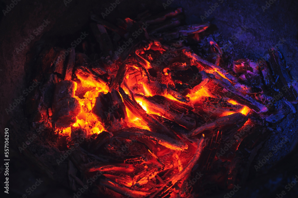 Image of charcoal being burned in an ancient clay oven
